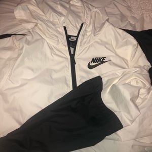 white and black nike colorblock rain jacket